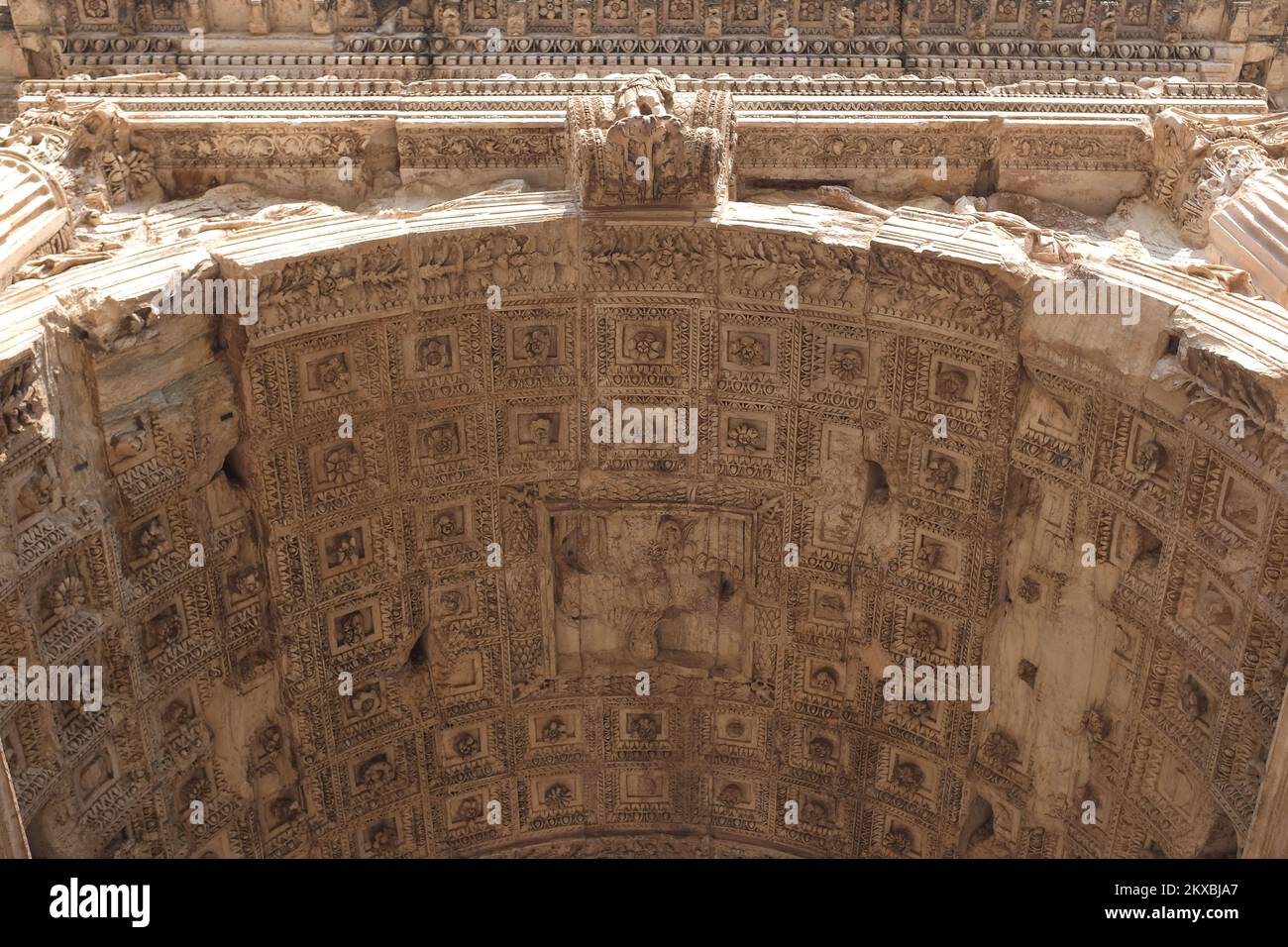 Rome, Italy - close-up under Arch of Titus. Ruins along Via Sacra in Roman Forum. Ancient arch celebrating fall of Jerusalem. Jewish diaspora symbol. Stock Photo
