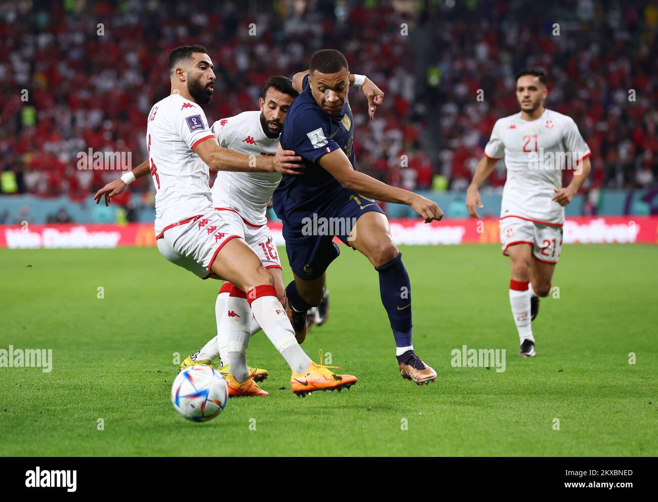 Ar Rayyan, Qatar, 30th November 2022.   Kylan Mbappe of France goes past Yassine Meriah of Tunisia during the FIFA World Cup 2022 match at Education City Stadium, Ar Rayyan. Picture credit should read: David Klein / Sportimage Credit: Sportimage/Alamy Live News Stock Photo