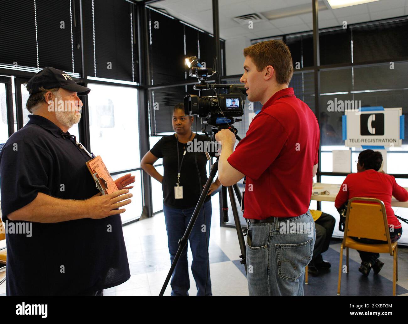 Tornado - Wilson, N. C. , April 27, 2011   FEMA Community Relations Specialist Stephen Bailey answers questions during an interview with Raleigh NBC affiliate at the Wilson disaster recovery center. FEMA is responding to severe storms and deadly tornadoes that damaged or destroyed homes and businesses across North Carolina on April 16, 2011. David Fine/FEMA. North Carolina Severe Storms, Tornadoes, And Flooding. Photographs Relating to Disasters and Emergency Management Programs, Activities, and Officials Stock Photo