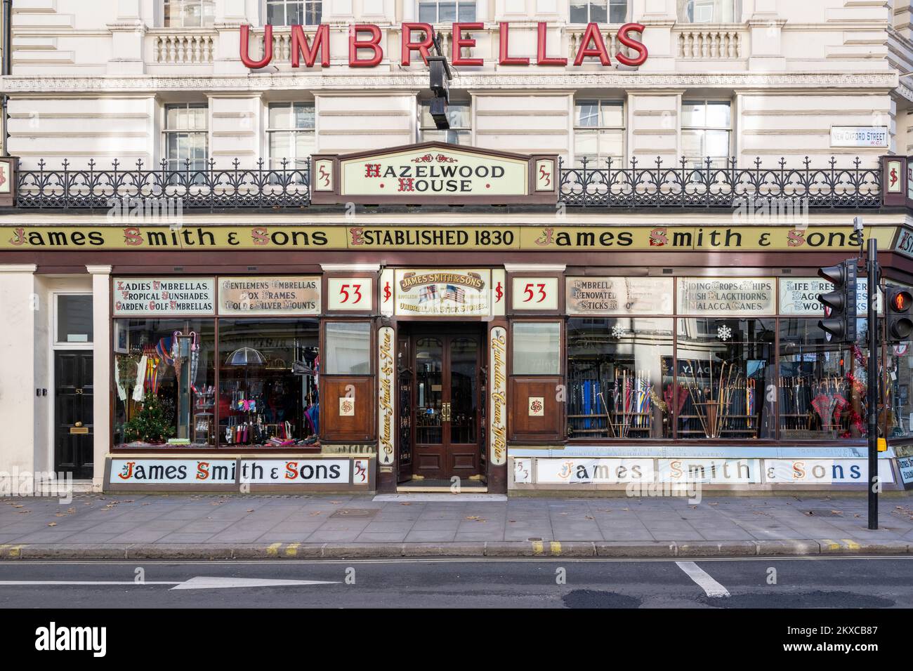 James Smith & Sons umbrella shop, Hazelwood House, New Oxford Street, with largely unaltered Victorian shop front.  Hazelwood House, 53 New Oxford Str Stock Photo