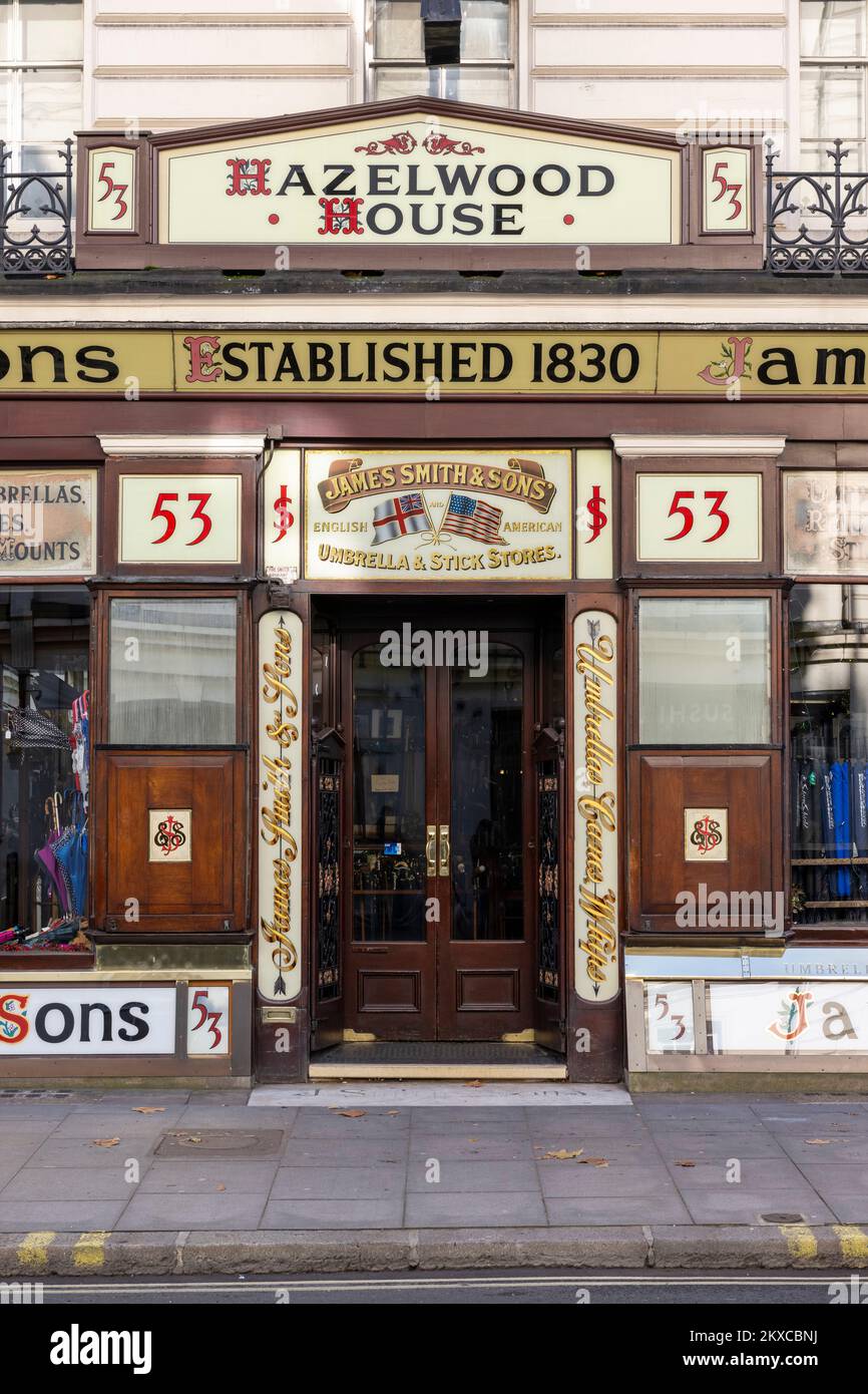 James Smith & Sons umbrella shop, Hazelwood House, New Oxford Street, with largely unaltered Victorian shop front.  Hazelwood House, 53 New Oxford Str Stock Photo