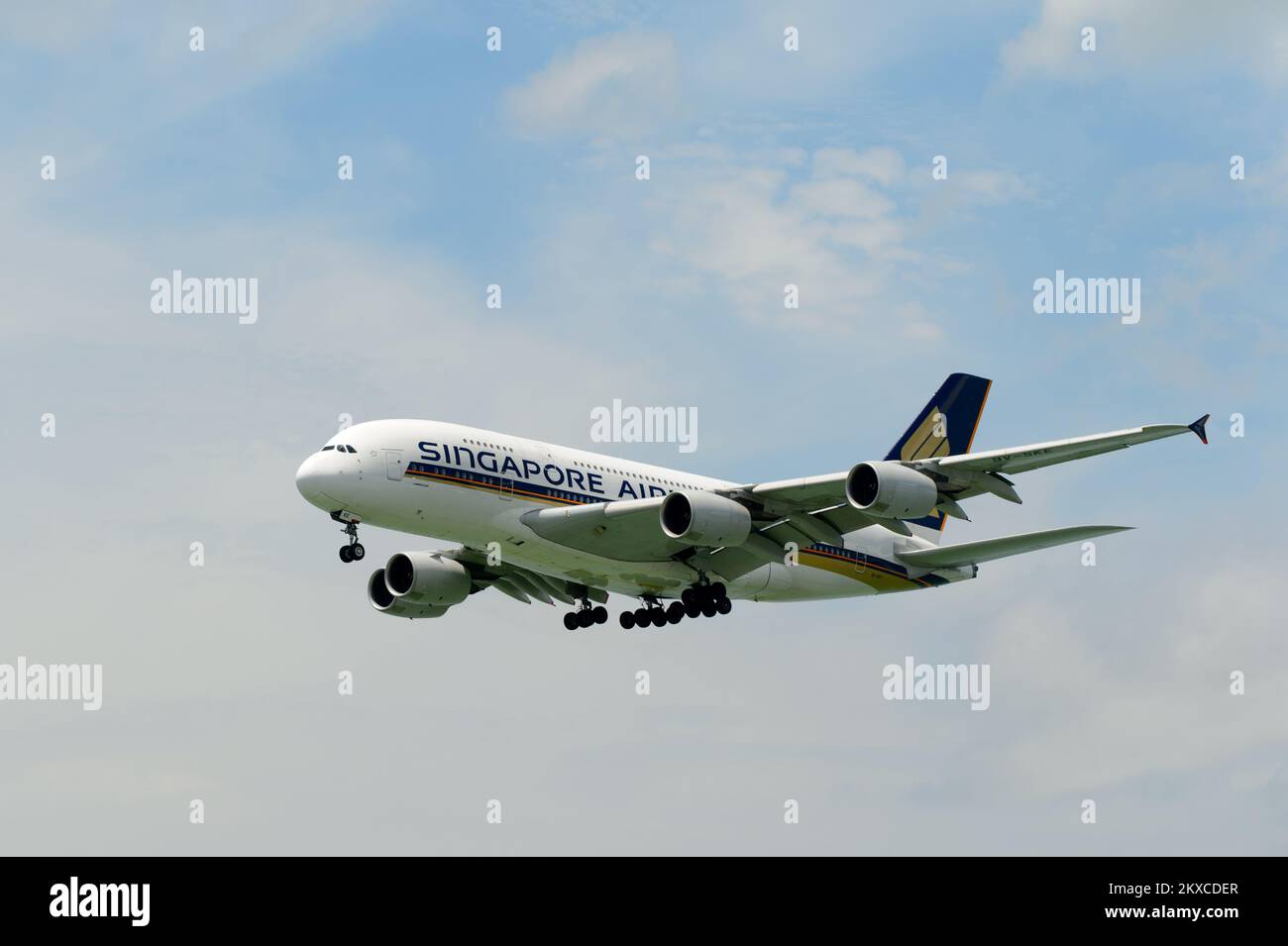 HONG KONG - JUNE 04, 2015: Singapore Airlanes aircraft landing. Singapore Airlines Limited is the flag carrier of Singapore which operates from its hu Stock Photo