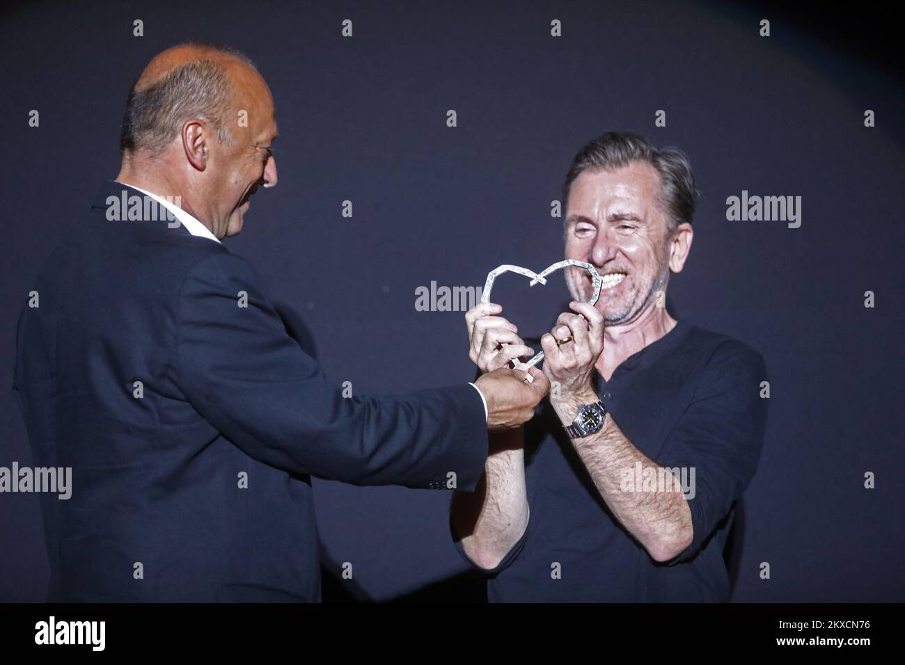 Actor Tim Roth receives an Honorary Heart of Sarajevo award during a ...