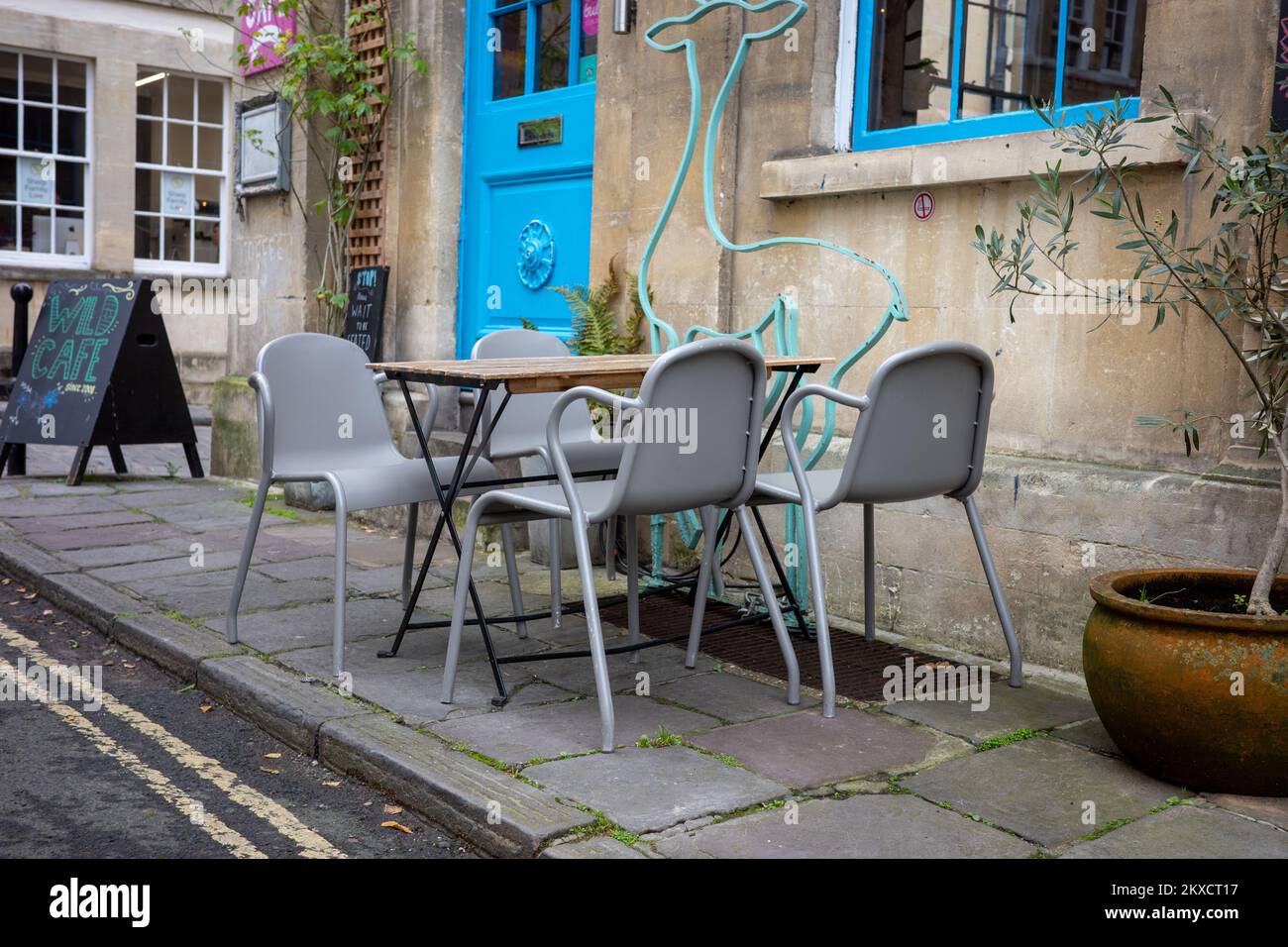 Tables and chairs outside a restaurant in Bath, UK Stock Photo Alamy
