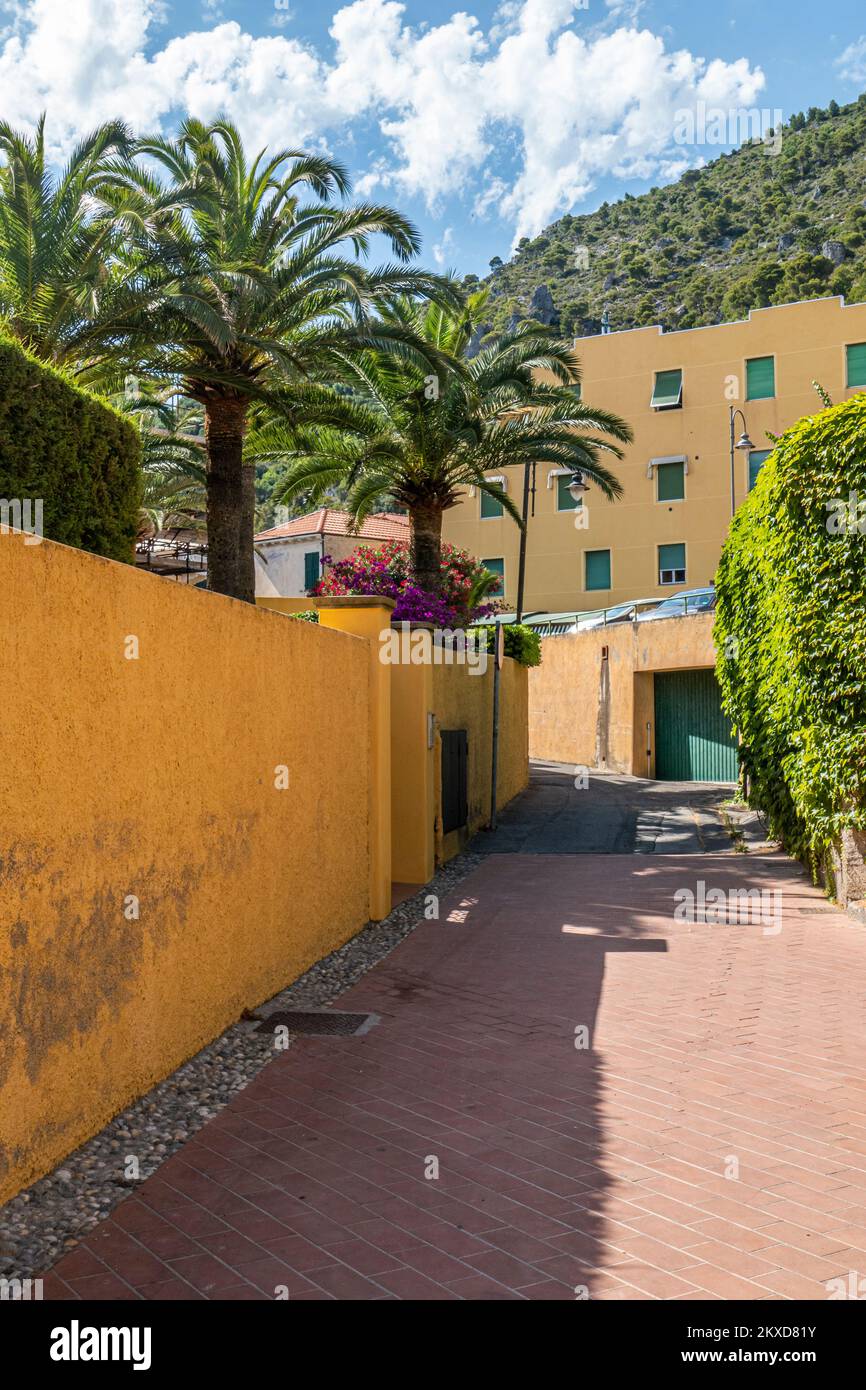 Varigotti, Italy - 10-07-2021: Characteristic colorful houses and streets in the picturesque village of Varigotti Stock Photo