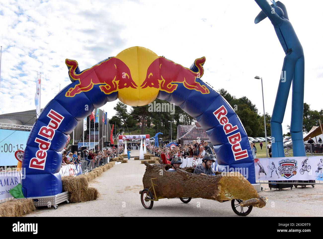 A competitors drives their homemade vehicles without an engine during ...