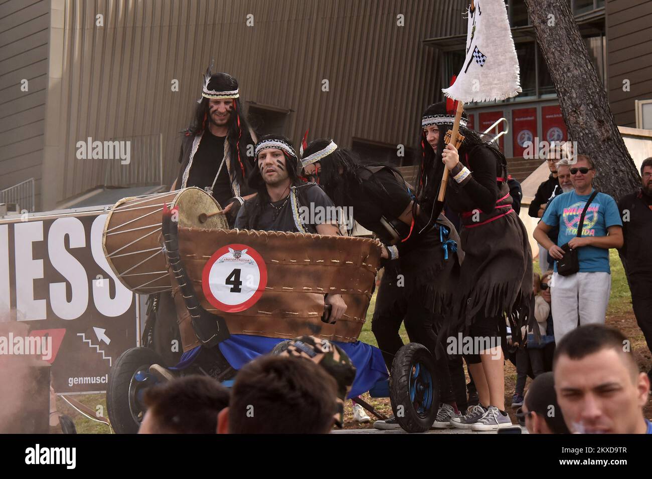 A competitors drives their homemade vehicles without an engine during ...