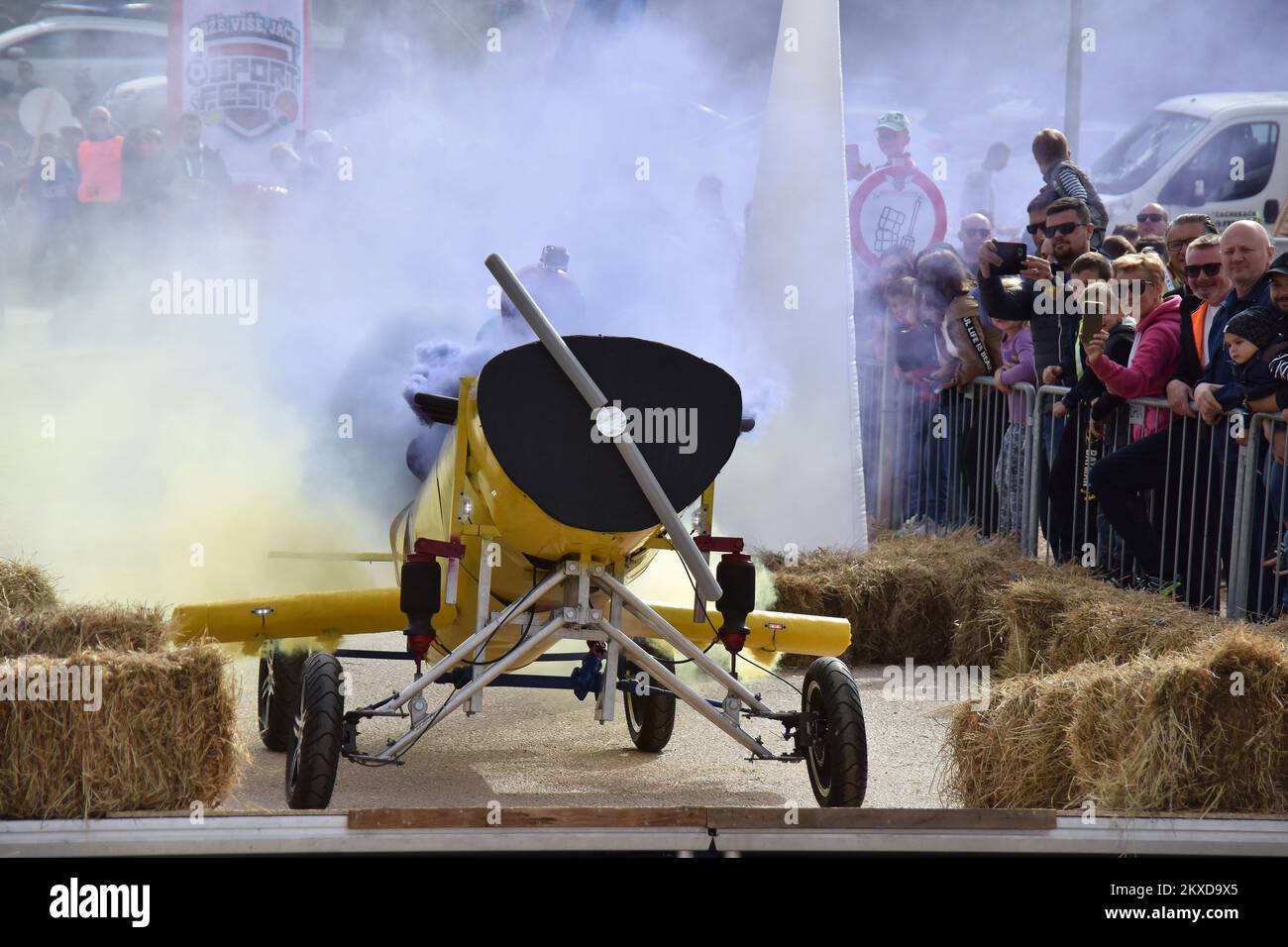 A competitors drives their homemade vehicles without an engine during ...