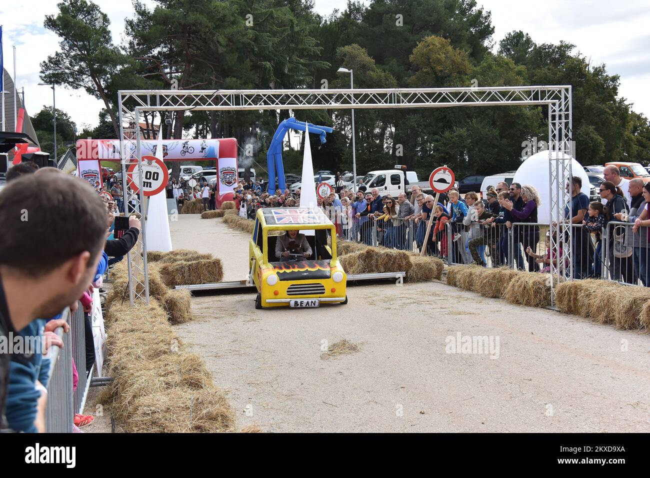 A competitors drives their homemade vehicles without an engine during ...