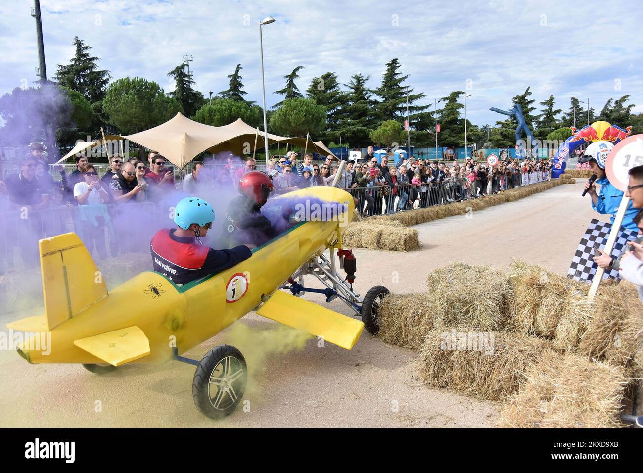 A competitors drives their homemade vehicles without an engine during ...