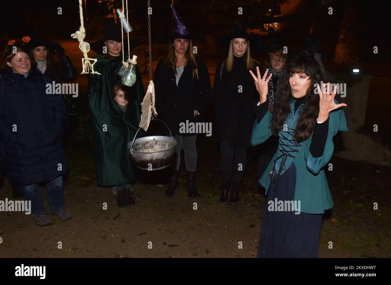 31.10.2019., Zagreb, Croatia - People dressed in witches in night tour called Uppertown witches. The Upper town witches is a night tour of the Upper Town and its landmarks with a costumed guide .It includes interactive elements and lively performers. Meet the dark side of Zagreb from the Middle Ages onwards through an entertaining programme, combining the witchcraft beliefs, the real practice and historical events in the background. Photo: Davorin Visnjic/PIXSELL Stock Photo