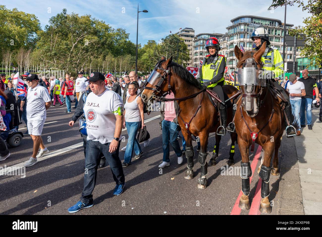 Democratic Football Lads Alliance, DFLA, marched towards Parliament, London, UK, in a protest demonstration against terrorism. Mounted police escort Stock Photo