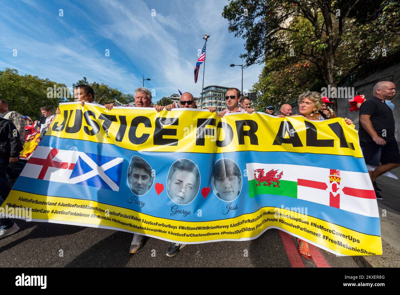 Justice for all banner at Football Lads Alliance, DFLA, protest march towards London, UK, in a protest demonstration. Josh, Harry and George killed Stock Photo