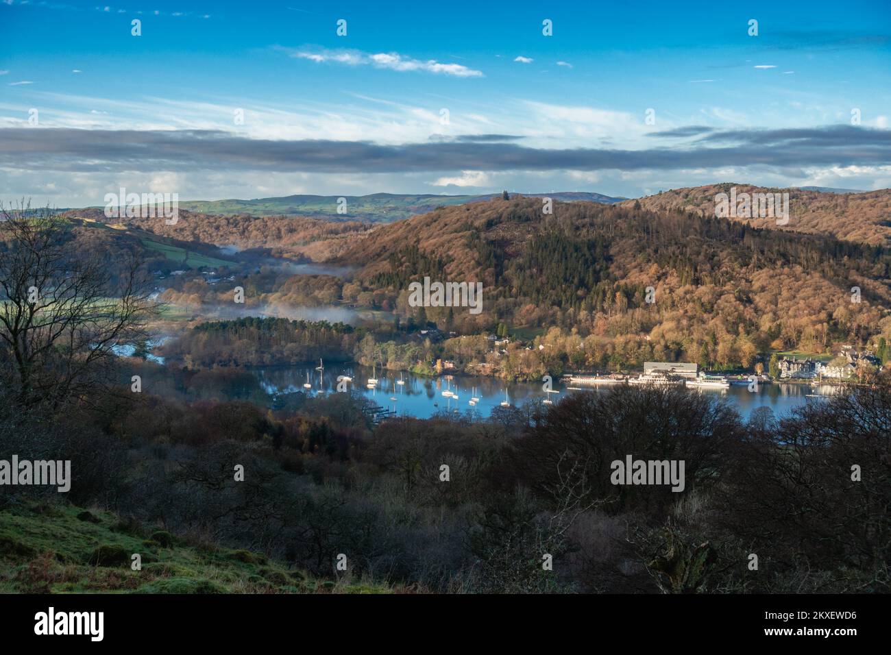 View of Lakeside, the river, Newby Bridge and Windermere with boats seen from Gummers How in the Lake District National Park in Cumbria in autumn, UK Stock Photo