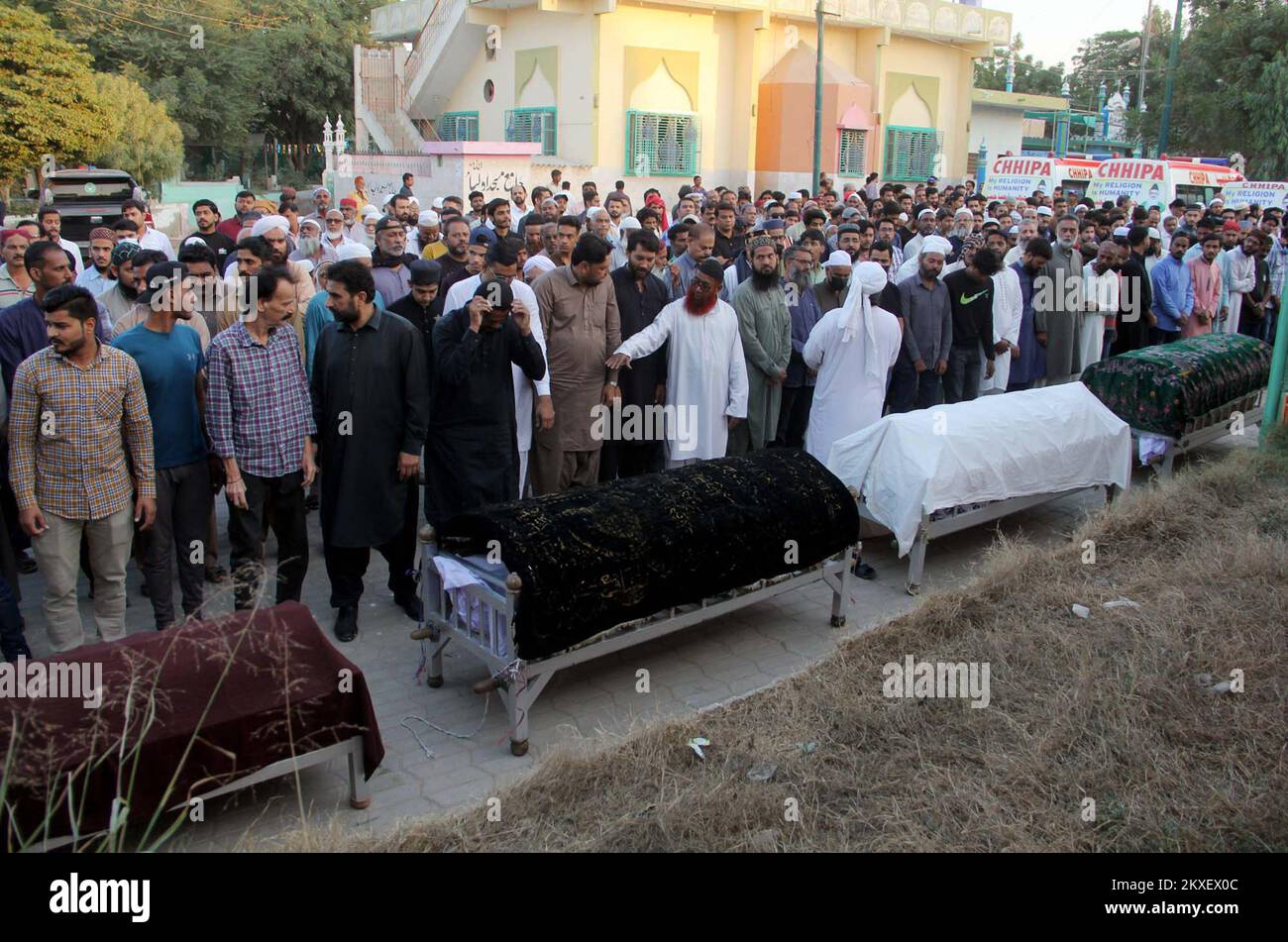 Funeral prayer of a woman, her three teenage daughters, who were found