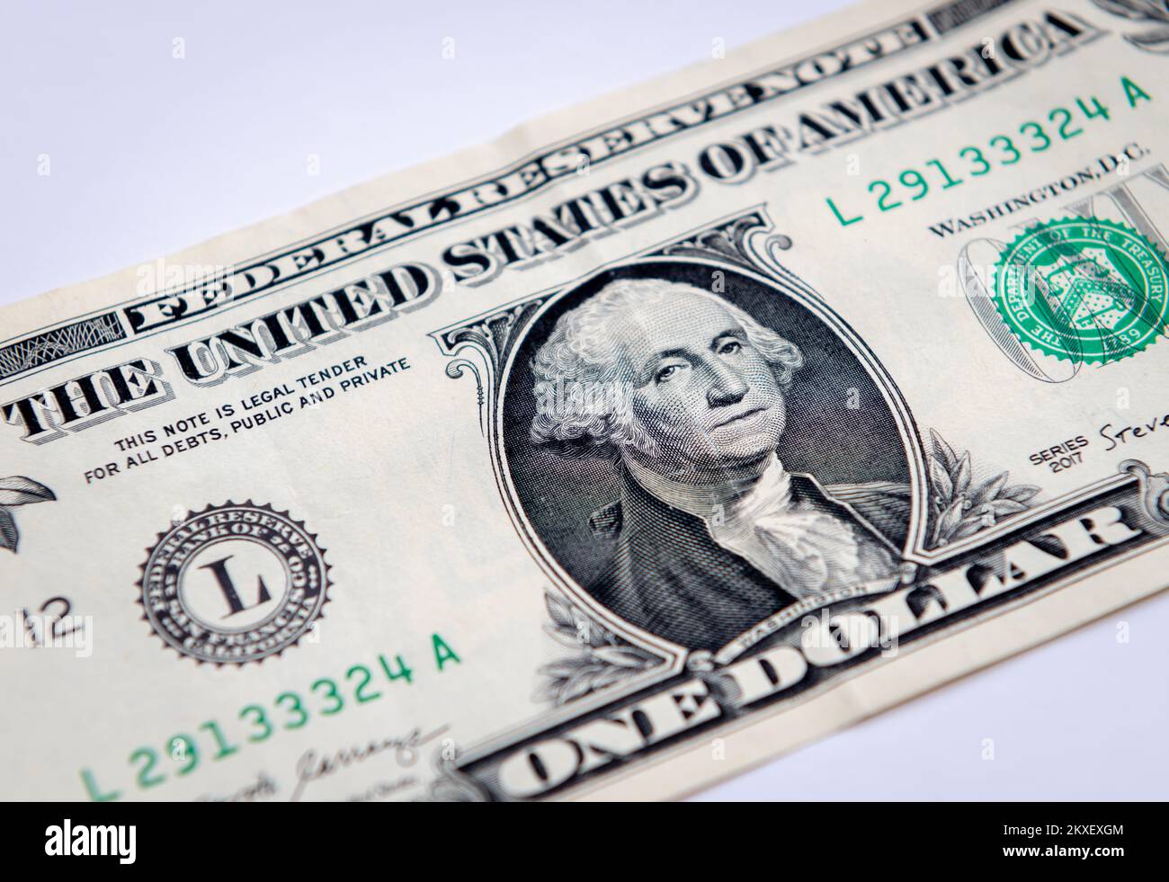 Close up of a US one dollar bill isolated in white background. Stock Photo