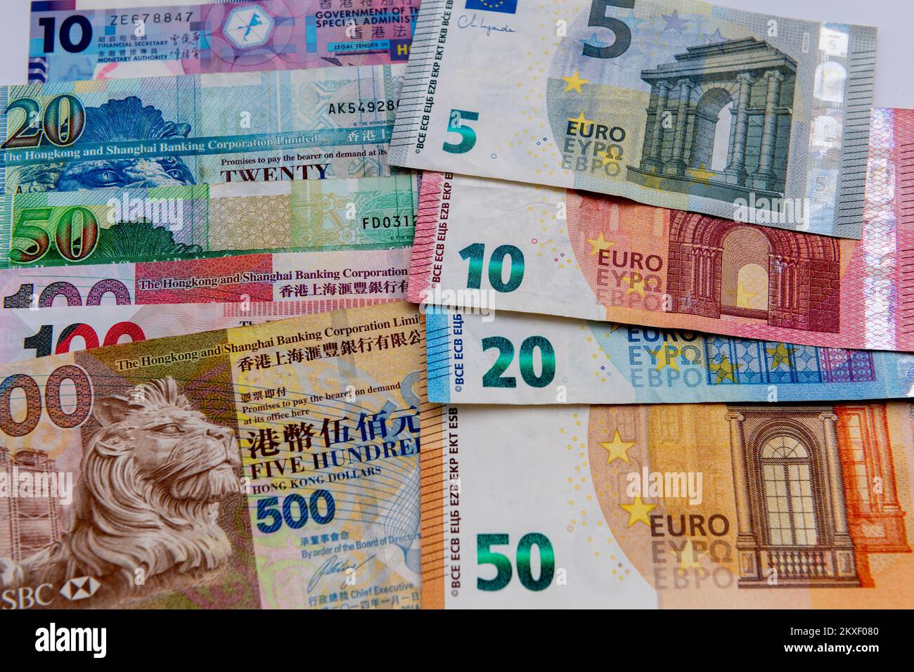 Close up of various Hong Kong Dollar bills  and the Euro bank notes. Stock Photo