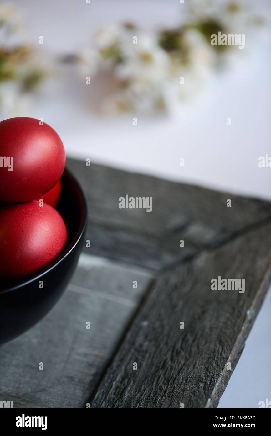 Easter eggs in small bowls. Stock Photo