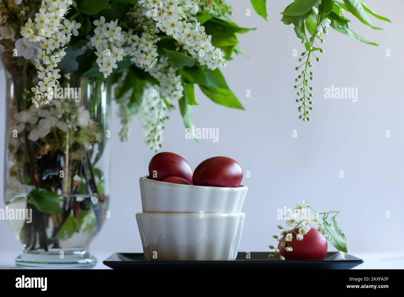 Easter eggs in small bowls. Stock Photo