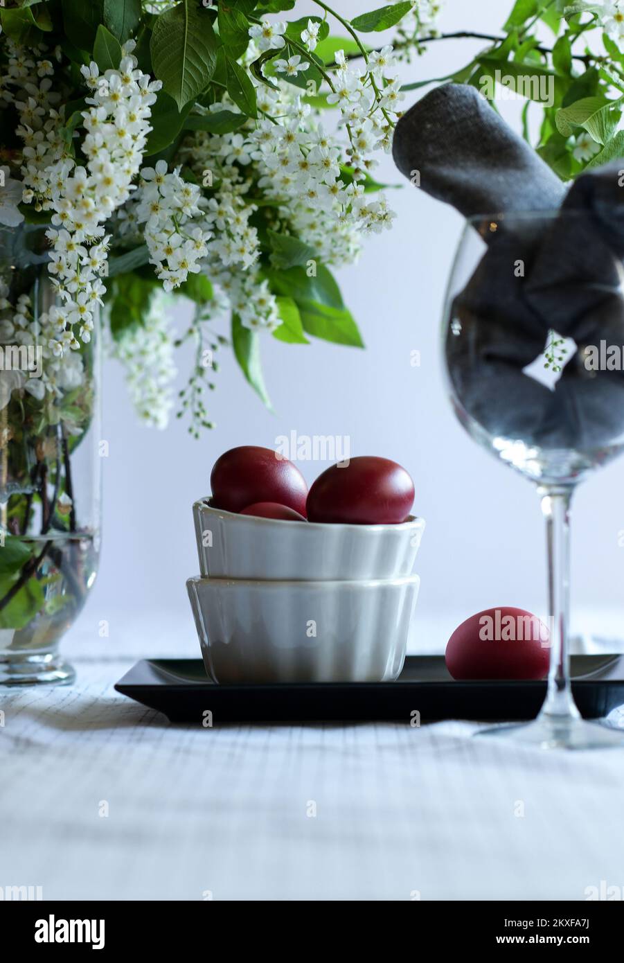 Easter eggs in small bowls. Stock Photo