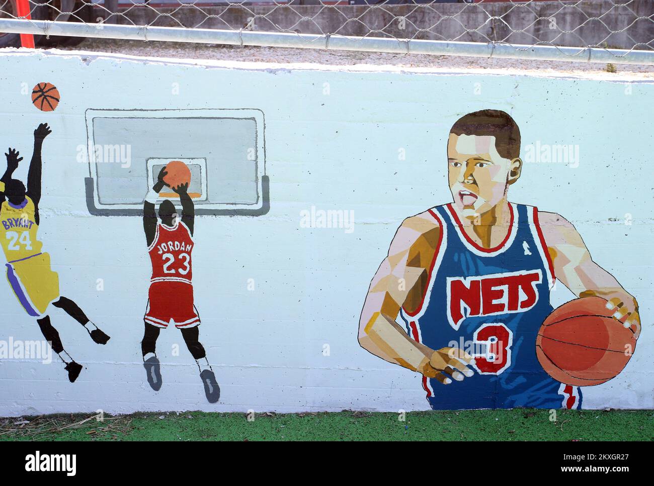 Mural dedicated to Drazen Petrovic on the basketball court at Mejasi in Split, Croatia on July 14, 2020. The basketball court is painted with the names of Croatian basketball legends Kresimir Cosic, Dino Radja, Toni Kukoc and murals dedicated to Drazen Petrovic and NBA players Kobe Bryant and Michael Jordan. Photo: Ivo Cagalj/PIXSELL Stock Photo