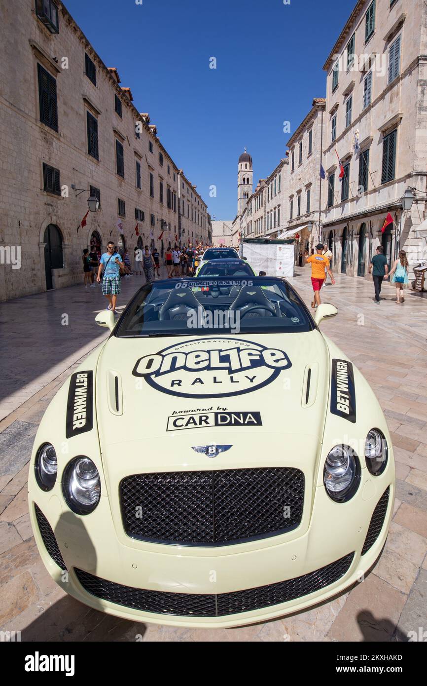 Luxury cars on the Stradun are waiting for the start of OneLife Rally