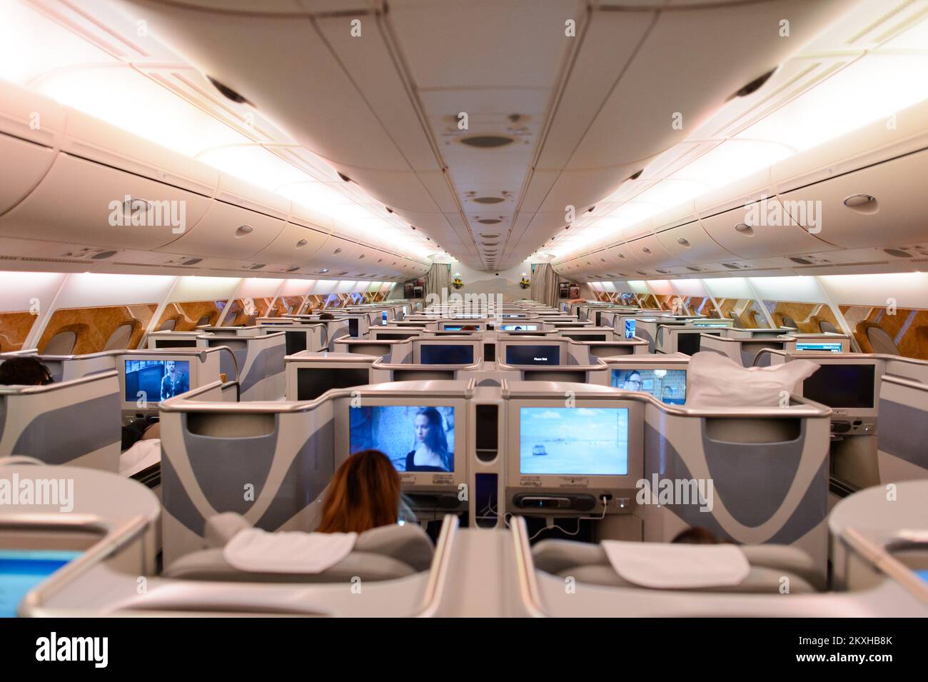 HONG KONG - JUNE 18, 2015: Emirates Airbus A380 business class interior. Emirates is one of two flag carriers of the United Arab Emirates along with E Stock Photo