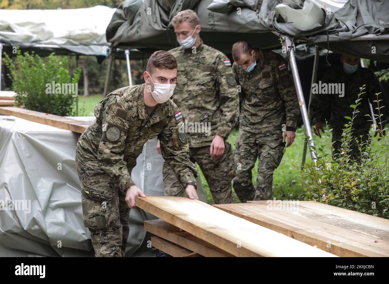 Army is setting up tents in front of The School of Medicine of the