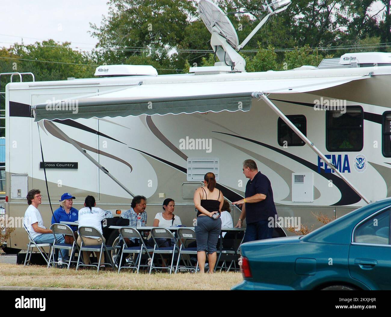 Wildfire - Bastrop County, Texas, September 11, 2011   Wildfire survivors from Bastrop, Texas visit the FEMA Mobile Disaster Registration Intake Center that was set up to help people register for federal aid.. Texas Wildfires. Photographs Relating to Disasters and Emergency Management Programs, Activities, and Officials Stock Photo