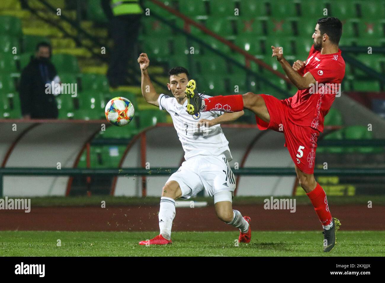Josip Corluka and Milad Mohammadi in action during friendly match between Bosnia and Herzegovina and Iran, in Sarajevo,Bosnia and Herzegovina , November 12, 2020. Photo: Armin Durgut/PIXSELL  Stock Photo