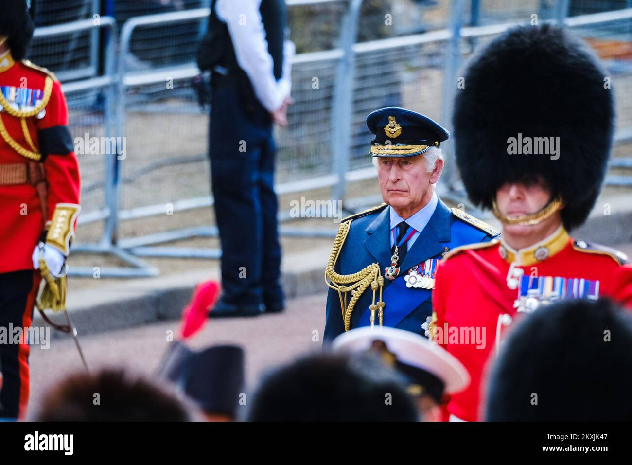 King Charles III walks behind the coffin of his mother, Majesty Queen Elizabeth II photographed during The ceremonial procession to transport her late Majesty Queen Elizabeth II’s coffin from Buckingham Palace to the Palace of Westminster at The Mall , London on Wednesday 14 September 2022 . Picture by Julie Edwards. Stock Photo