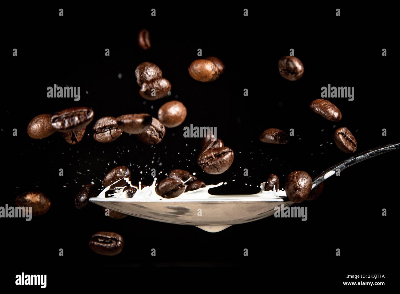 Coffee beans in a spoonful of milk in Zagreb, Croatia on November 27
