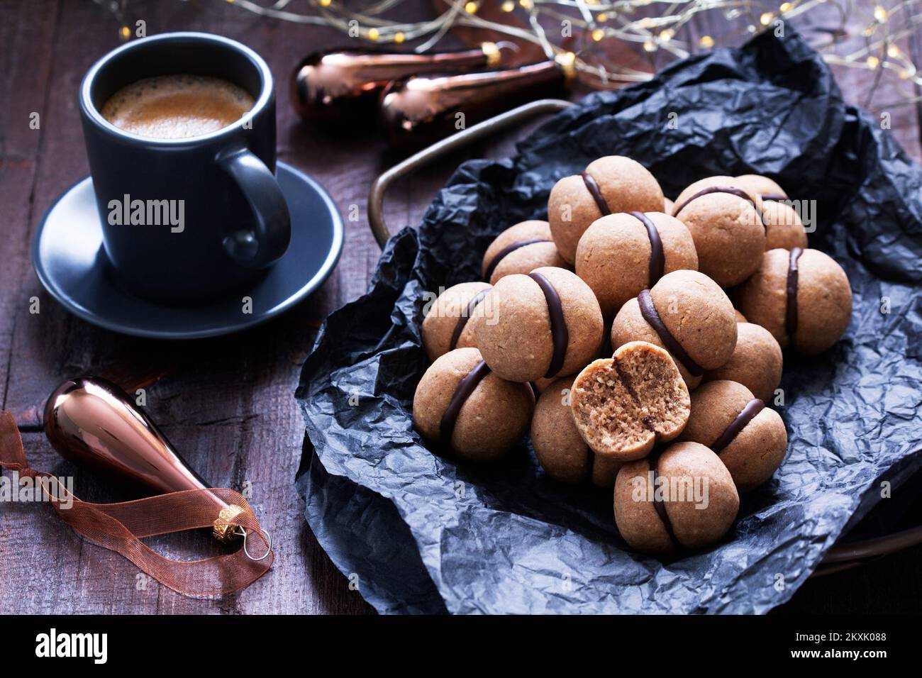 Lady's kisses, traditional Italian nut cookies with coffee and chocolate filling. Stock Photo