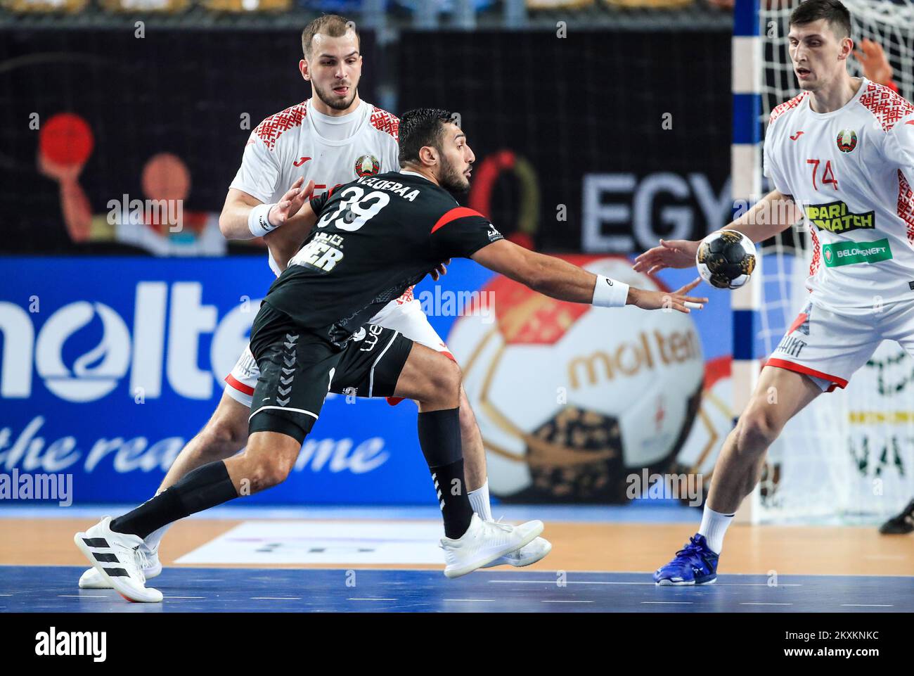 CAIRO, EGYPT - JANUARY 22: Artsem Karalek of Belarus and Yehia El-Deraa of Egypt during the 27th IHF Men's World Championship Group IV match between Egypt and Belarus at Cairo Stadium Sports Hall in Cairo, Egypt on January 22, 2021. Photo: Slavko Midzor/PIXSELL Stock Photo