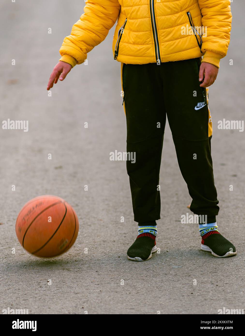 Young boy holding in hands Basketball sport Young little caucasian