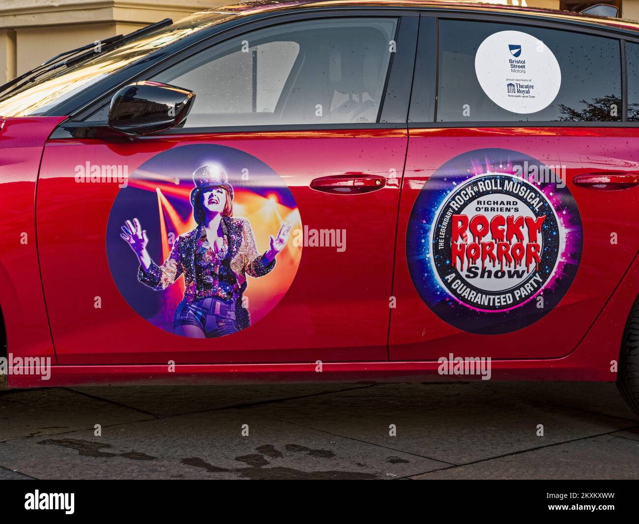 Rocky Horror Show advertisment on vehicle outside the Theatre Royal, Newcastle upon Tyne, UK Stock Photo