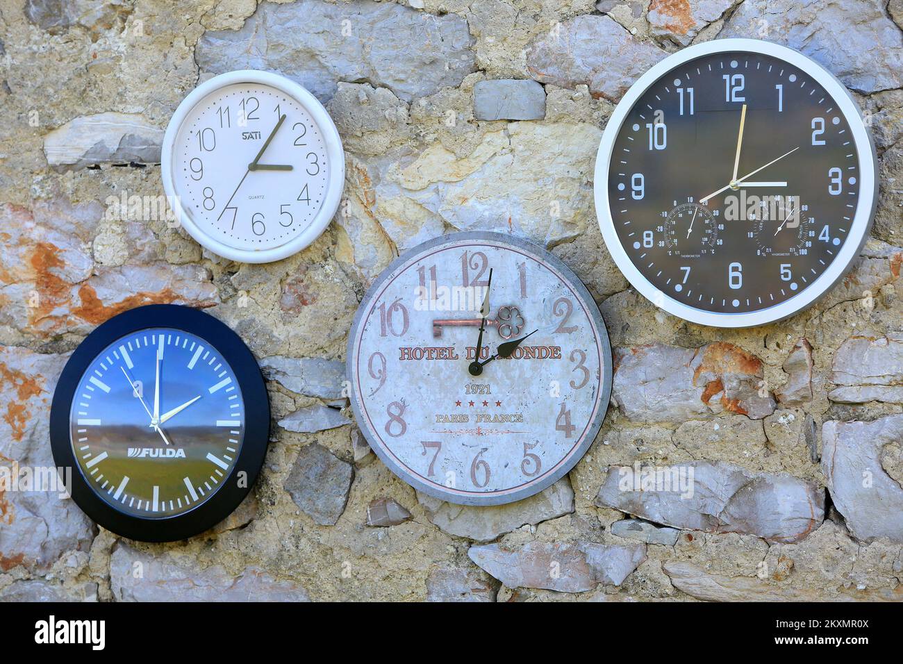 Photo taken on March 25, 2021 shows illustrative photo of wall clocks