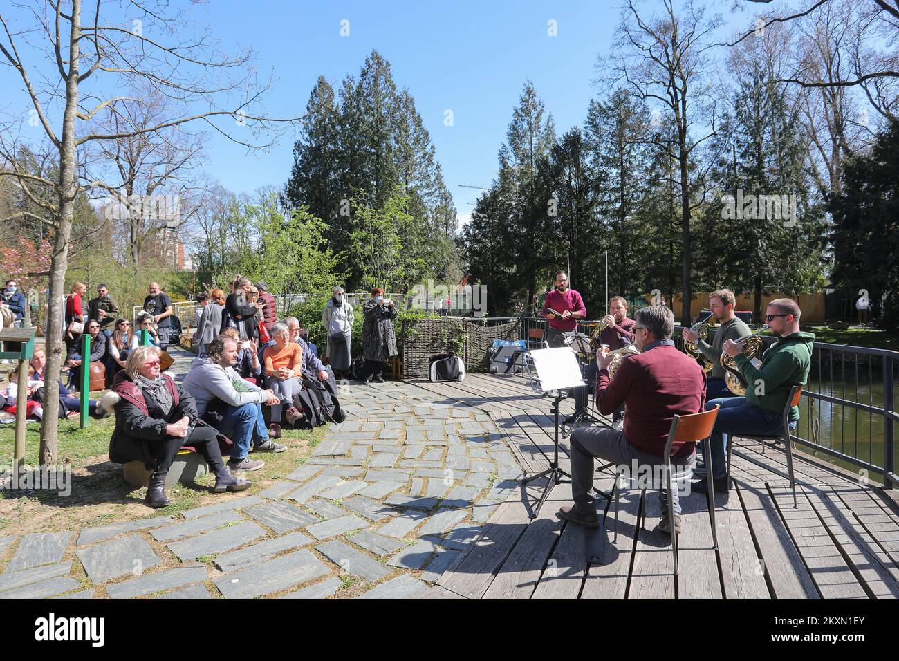 Members of Zagreb Philharmonic Orchestra play theirs instrument durnig a open air concert at Swan lake in Zagreb ZOO, Croatia on April 10, 2021. Photo: Tomislav Miletic/PIXSELL Stock Photo