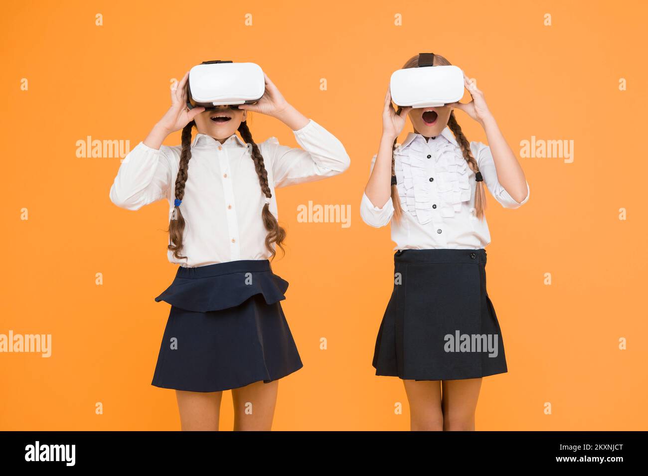 Kids use modern VR technology. Virtual reality. VR headset. Future ...