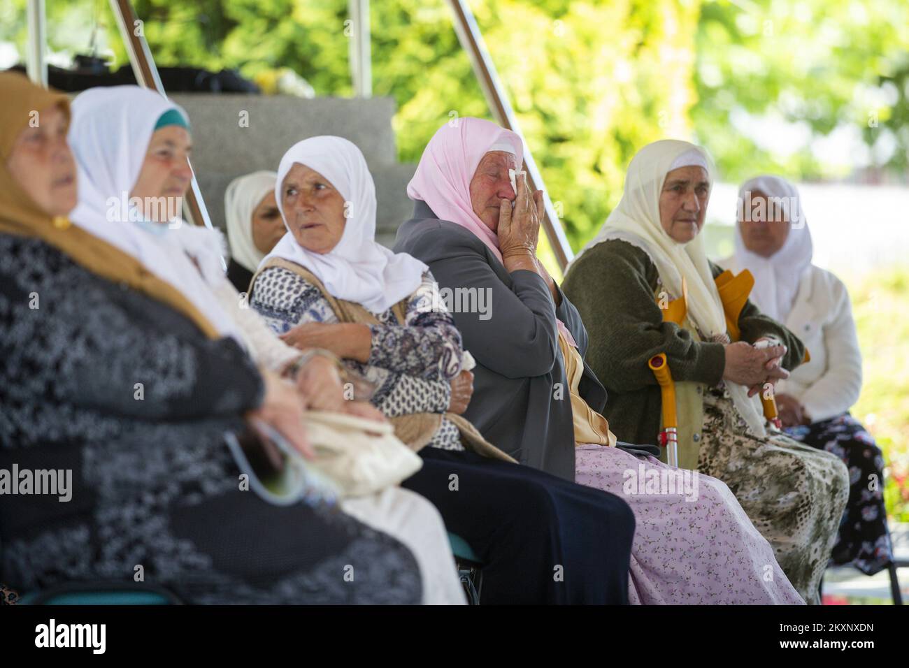 Mothers of Srebrenica follow the verdict against Ratko Mladic, in Potocari, Bosnia and Herzegovina ,on June 8, 2021 .The commander, the Bosnian Serb former general Ratko Mladic, was convicted in 2017 of genocide, crimes against humanity and war crimes. He was sentenced to life in prison. On Tuesday, that verdict was upheld by the International Criminal Tribunal for the Former Yugoslavia in The Hague, drawing a close to one of the darkest chapters in modern European history and ending a legal struggle that stretched back to 1995, when Mr. Mladic was first indicted.Now 79, Mr. Mladic has always Stock Photo