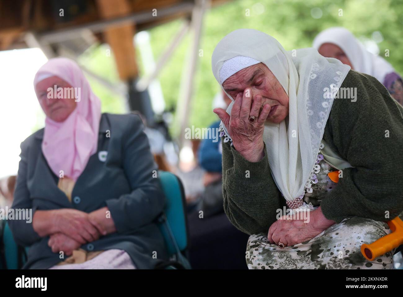 Mothers of Srebrenica follow the verdict against Ratko Mladic, in Potocari, Bosnia and Herzegovina ,on June 8, 2021 .The commander, the Bosnian Serb former general Ratko Mladic, was convicted in 2017 of genocide, crimes against humanity and war crimes. He was sentenced to life in prison. On Tuesday, that verdict was upheld by the International Criminal Tribunal for the Former Yugoslavia in The Hague, drawing a close to one of the darkest chapters in modern European history and ending a legal struggle that stretched back to 1995, when Mr. Mladic was first indicted.Now 79, Mr. Mladic has always Stock Photo