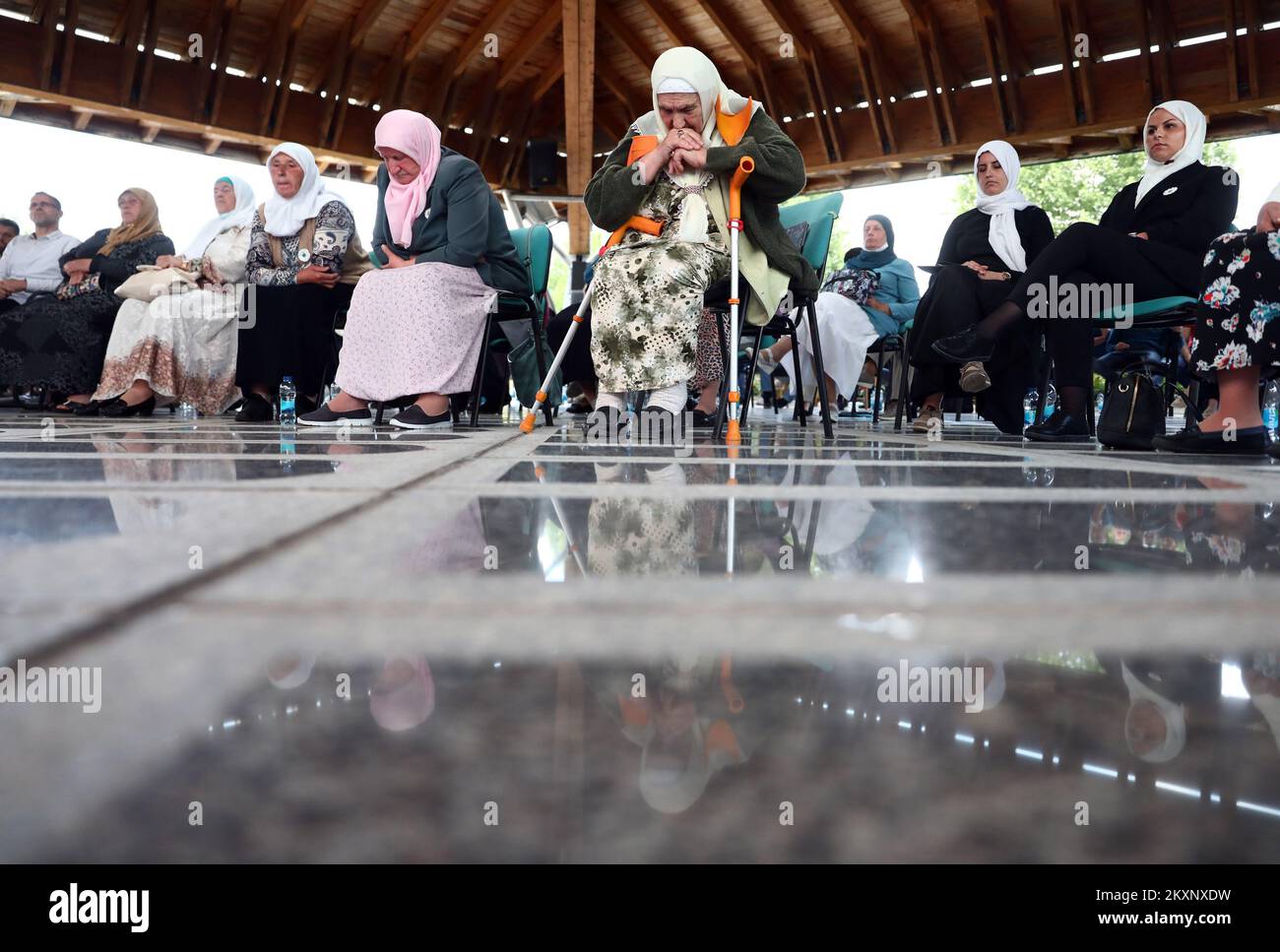 Mothers of Srebrenica follow the verdict against Ratko Mladic, in Potocari, Bosnia and Herzegovina ,on June 8, 2021 .The commander, the Bosnian Serb former general Ratko Mladic, was convicted in 2017 of genocide, crimes against humanity and war crimes. He was sentenced to life in prison. On Tuesday, that verdict was upheld by the International Criminal Tribunal for the Former Yugoslavia in The Hague, drawing a close to one of the darkest chapters in modern European history and ending a legal struggle that stretched back to 1995, when Mr. Mladic was first indicted.Now 79, Mr. Mladic has always Stock Photo