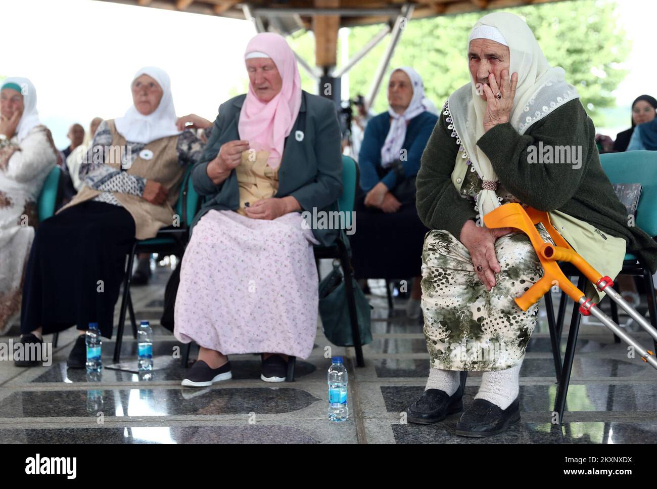Mothers of Srebrenica follow the verdict against Ratko Mladic, in Potocari, Bosnia and Herzegovina ,on June 8, 2021 .The commander, the Bosnian Serb former general Ratko Mladic, was convicted in 2017 of genocide, crimes against humanity and war crimes. He was sentenced to life in prison. On Tuesday, that verdict was upheld by the International Criminal Tribunal for the Former Yugoslavia in The Hague, drawing a close to one of the darkest chapters in modern European history and ending a legal struggle that stretched back to 1995, when Mr. Mladic was first indicted.Now 79, Mr. Mladic has always Stock Photo