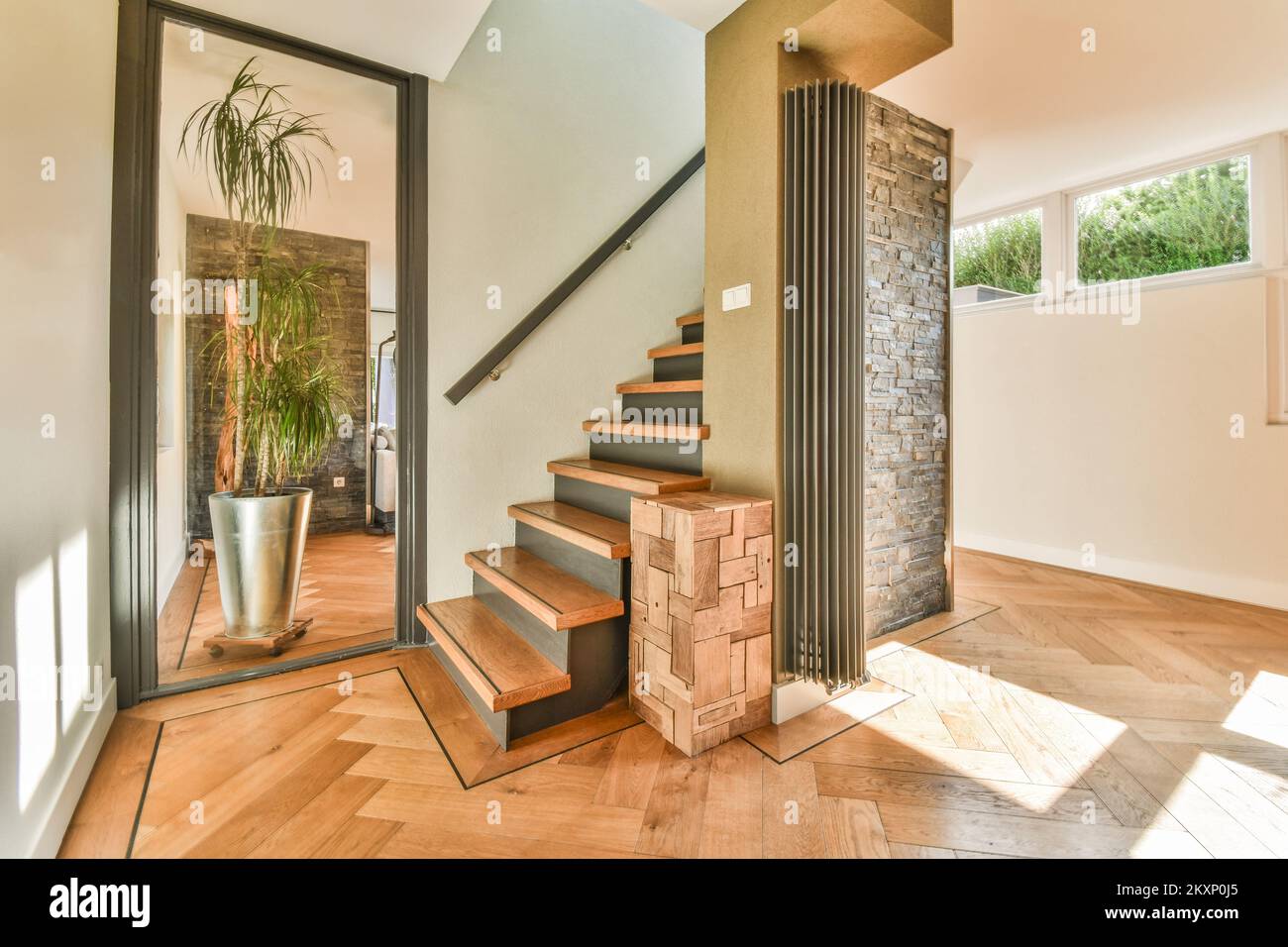 Minimalist Stairway Decor Reference: White Hallway With Wooden Stairway Leading To Second Floor Of