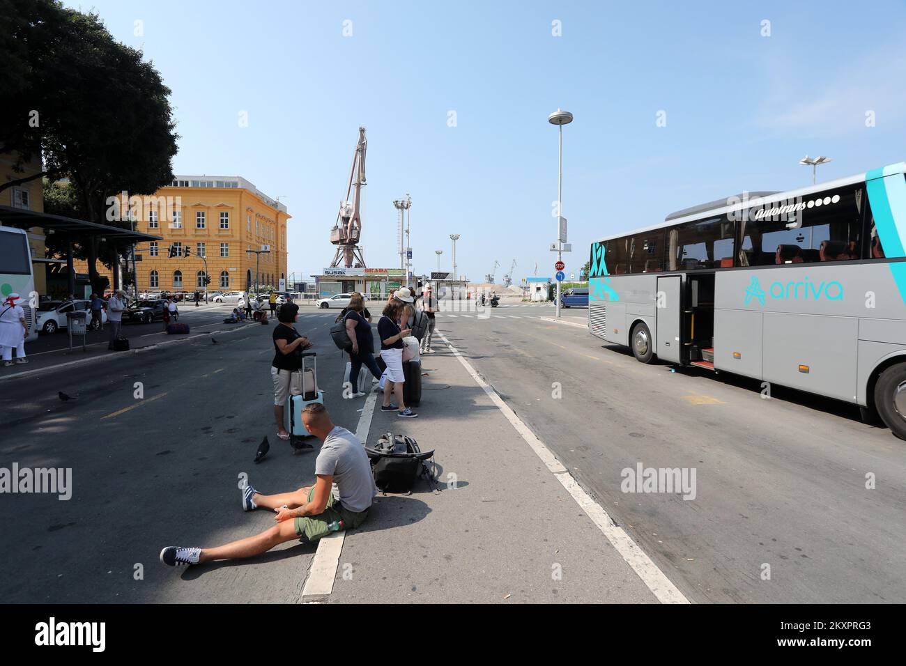 City bus station in Zabica in Rijeka on July 24, 2021. Passengers in the open air are waiting for buses at a deserted and untidy station. Photo: Goran Kovacic/PIXSELL  Stock Photo