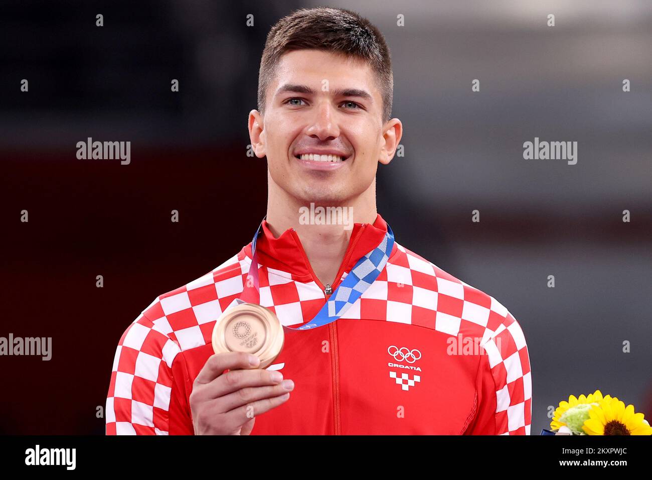 Bronze medalist Toni Kanaet of Croatia poses with the bronze medal for