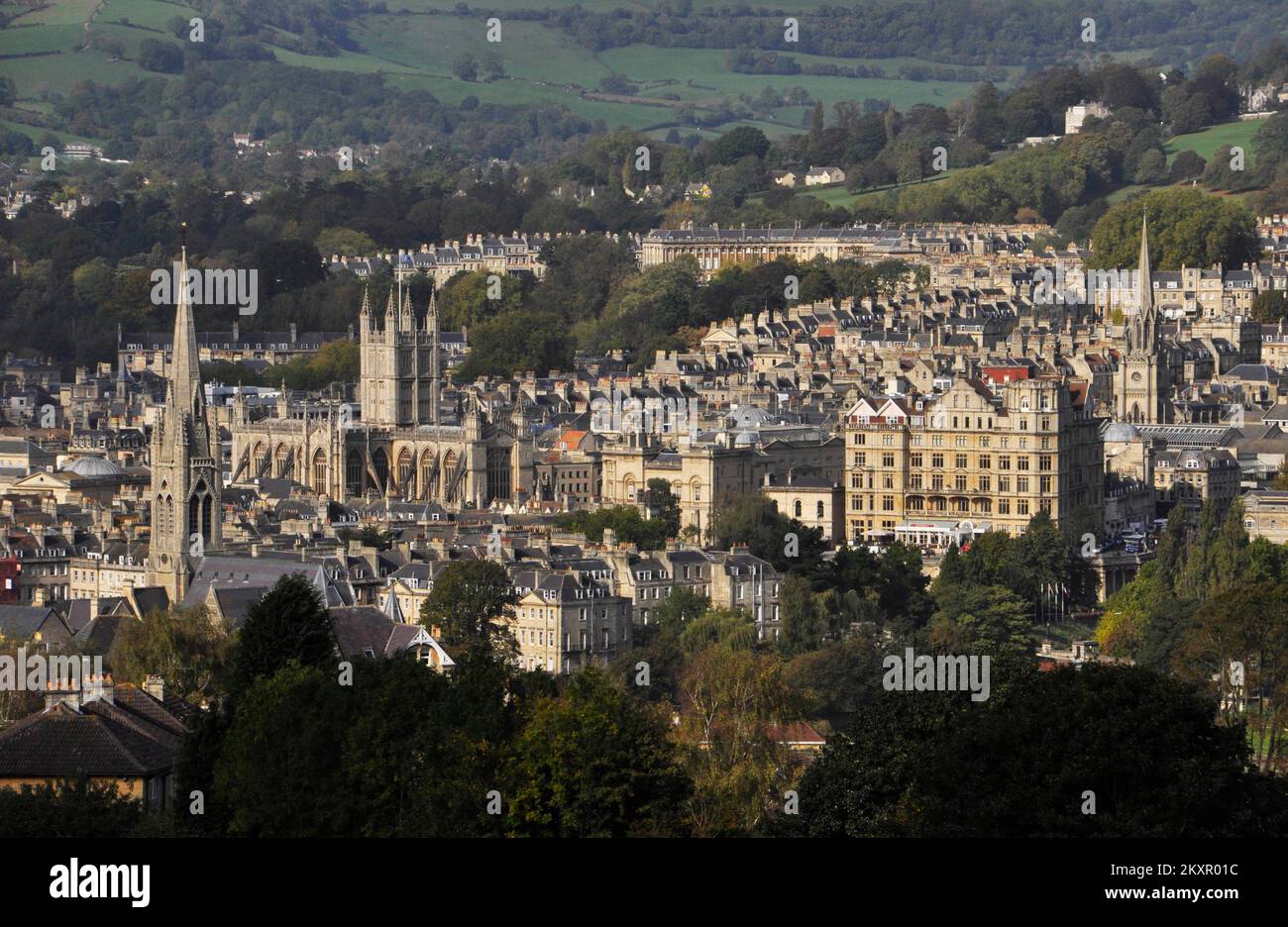 A view of Bath in Somerset from one of the hills which surround it. In the centre left is the Abbey and upper right is top of the Royal Crescent above Stock Photo
