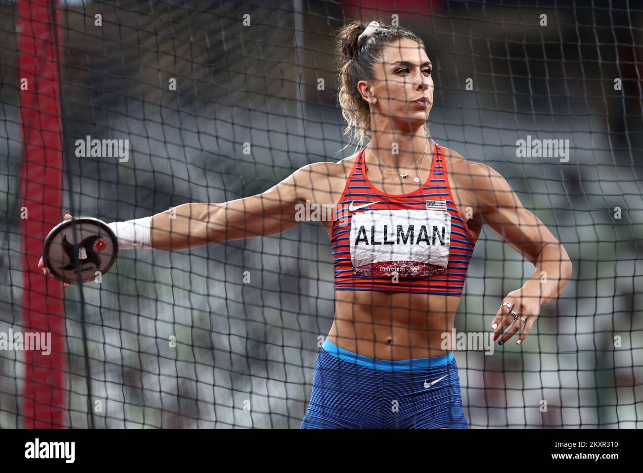 TOKYO, JAPAN AUGUST 02 Discus thrower, Valerie Allman of Team USA, celebrating gold medal in
