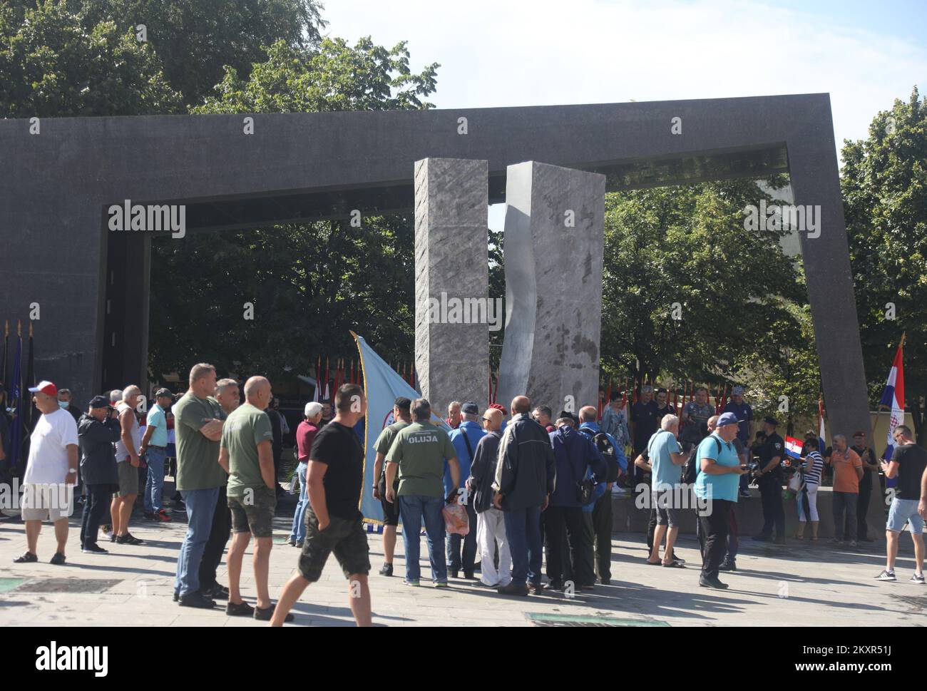 People take pictures during a celebration of 26th anniversary of