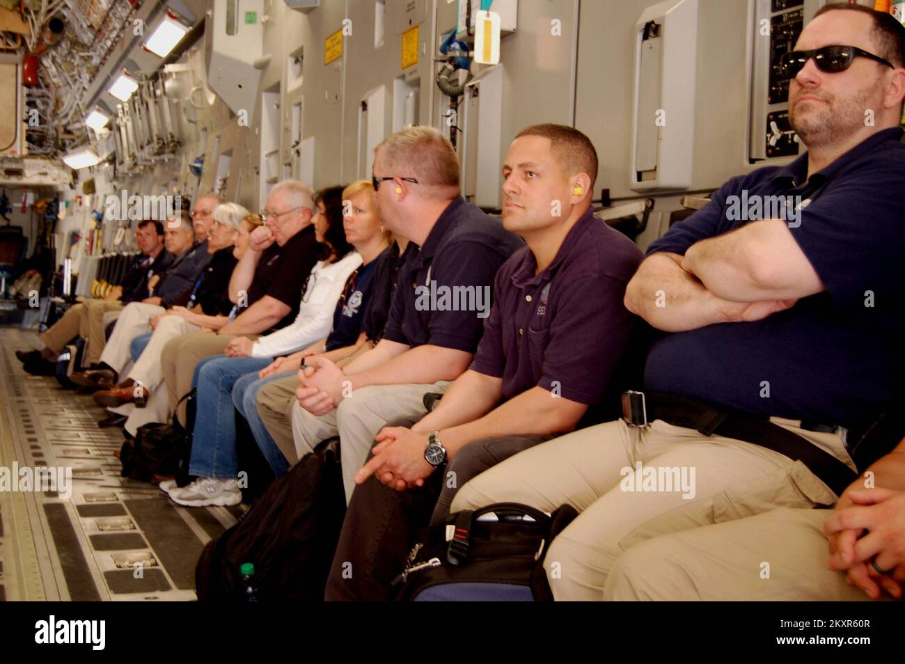 Emergency Planning and Security - Cookstown, N. J. , March 20, 2012   FEMA Region III Incident Management Assistance Team (IMAT) members receive final flight instructions on-board a C-17 aircraft during a Operational Readiness Exercise with the 621st Contingency Response Wing at Joint Base McGuire-Dix-Lakehurst.  .. Photographs Relating to Disasters and Emergency Management Programs, Activities, and Officials Stock Photo